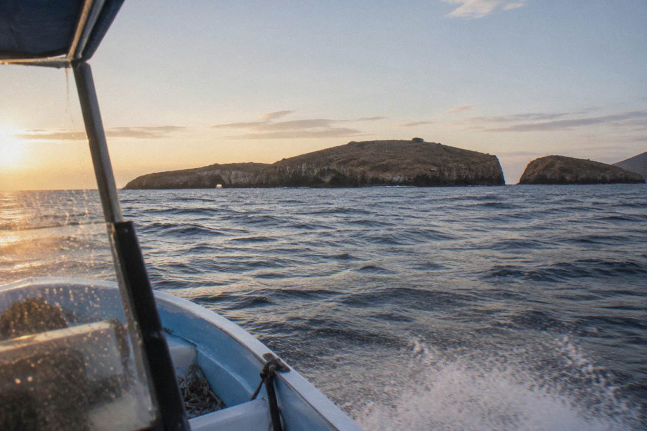 Open water of Banderas Bay with rocky islands on the horizon